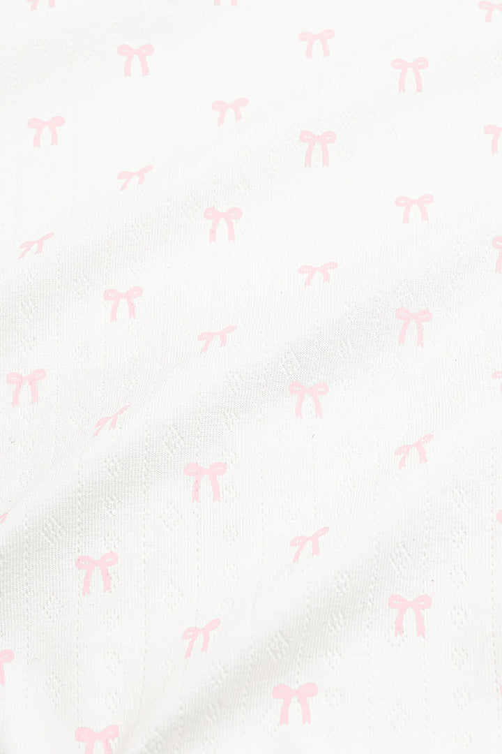 Kyte Baby Pointelle Zippered Footie with Picot Trim - Sweet Pink Bow